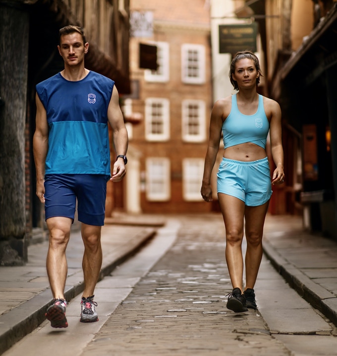 White man and woman wear Mocean Fitness activewear