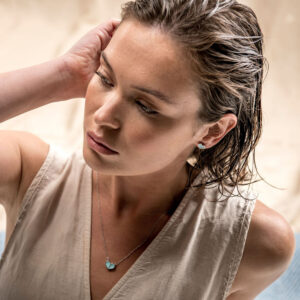 Woman wears Koa Jewellery Turquoise Maggie Necklace